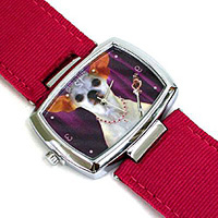 Chihuahua Watch is a cute white Chihuahua against a royal purple backdrop on watch face with a fuchsia watch band.
