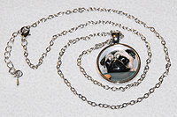Pug Necklace 6 - Round pendant and fawn Pug eyeing a cookie.